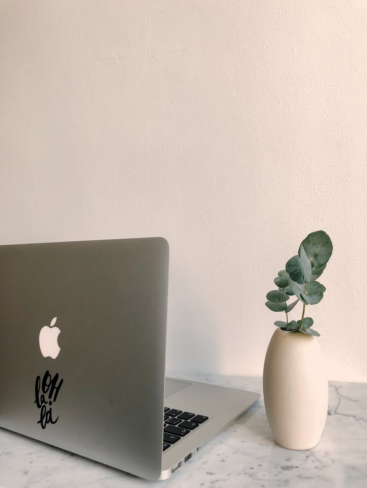 Photo of Macbook on Granite Desk